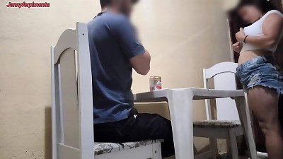 youthfull couple having hook-up in a bar in public