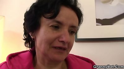 aged brown-haired grannie gives head and rides his chisel