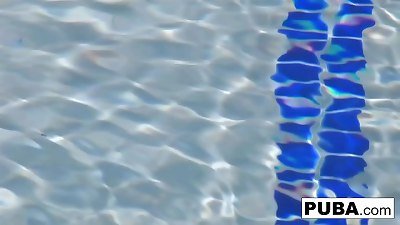 Kristina Rose plays with her gash in the pool