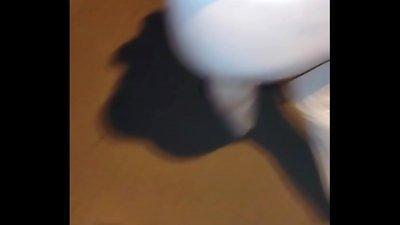 senior woman wearing red thread in transparent leggings, gripped on the street