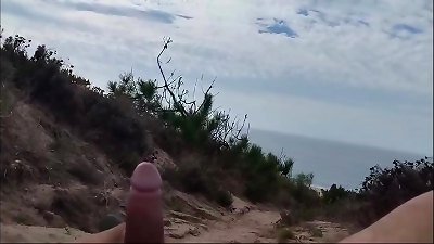 guy on bare beach blasts a bunch of milk
