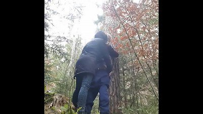 mother pegging in the woods