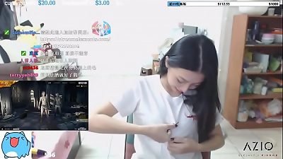 twitch streamer chinese showing perfect shape boobs in an titillating way